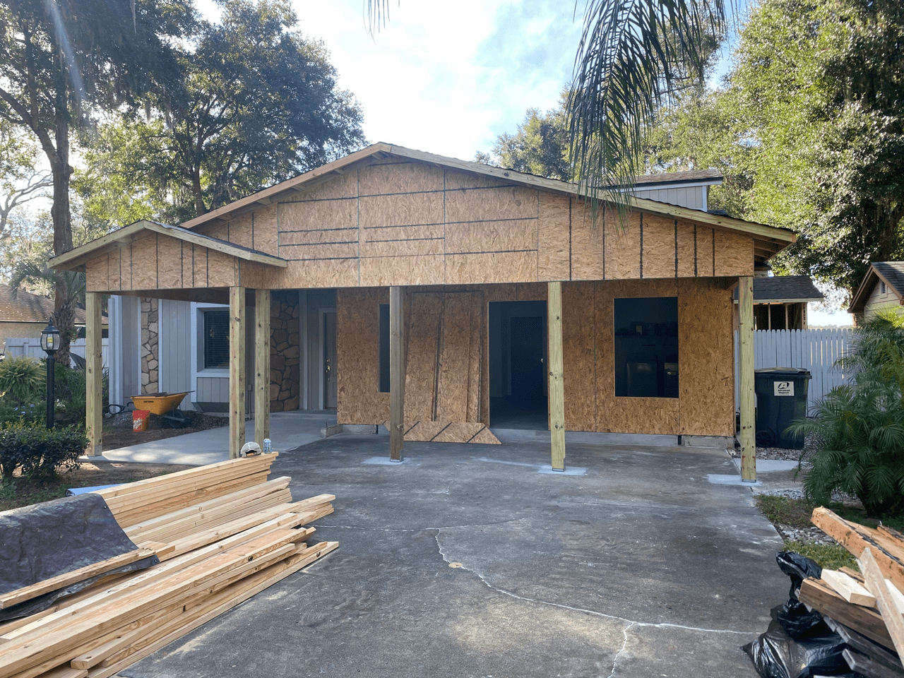 Shown here is a home in the middle of the construction process, featuring a garage conversion into a new room and indoor space.